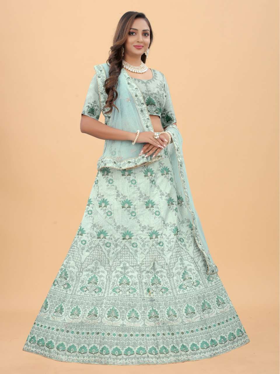 Light Pista Exclusive Wear Silk Embroidered Lehenga Choli Wholesale